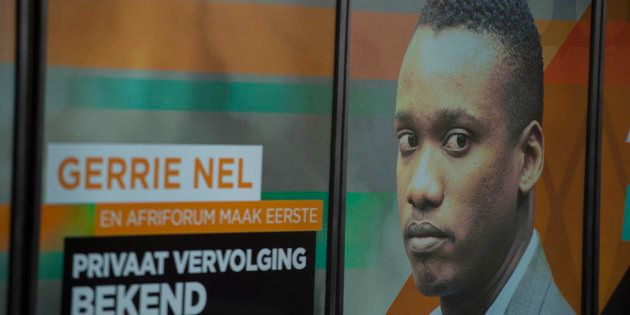 A poster with Duduzane Zuma's face is seen during AfriForum's media briefing to announce they will be privately prosecuting him on October 17, 2017, in Pretoria, South Africa.