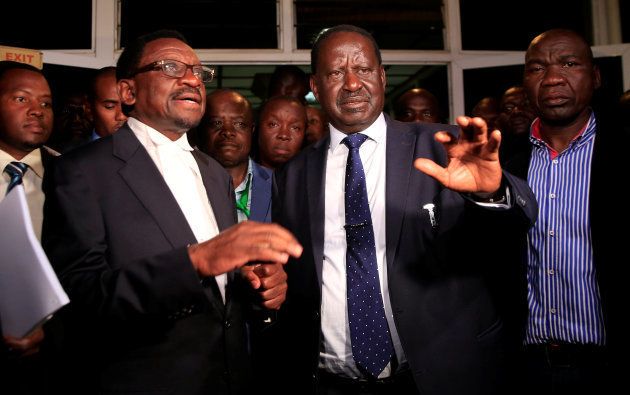 Kenyan opposition leader and the presidential candidate of the National Super Alliance (NASA) coalition Raila Odinga accompanied by coalition lead lawyer James Orengo, attend the news conference outside the Supreme Court in Nairobi, Kenya, September 20, 2017.