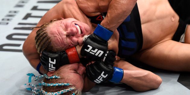 OKLAHOMA CITY, OK - JUNE 25: (L-R) Felice Herrig attempts to secure a rear choke submission against Justine Kish in their women's strawweight bout during the UFC Fight Night event at the Chesapeake Energy Arena on June 25, 2017 in Oklahoma City, Oklahoma. (Photo by Brandon Magnus/Zuffa LLC/Zuffa LLC via Getty Images)