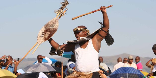 President Zuma's eldest son Edward dances past the groomsmen at his wedding to Phumelele Shange on October 8, 2011 in Nkandla, South Africa.