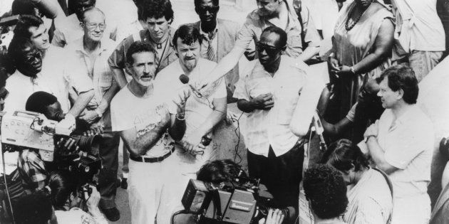 Breyten Breytenbach, one of the dissident Afrikaners on their visit to Dakar, Senegal, to meet with the ANC. Frederik van Zyl Slabbert is on the right, arms folded.