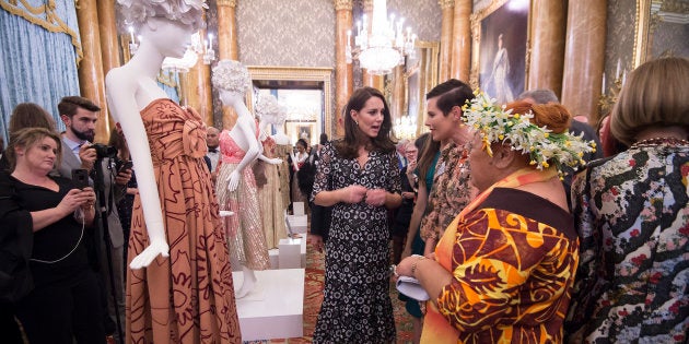 Catherine, Duchess of Cambridge, and Tukua Turia from The Cook Islands, attend The Commonwealth Fashion Exchange Reception at Buckingham Palace.