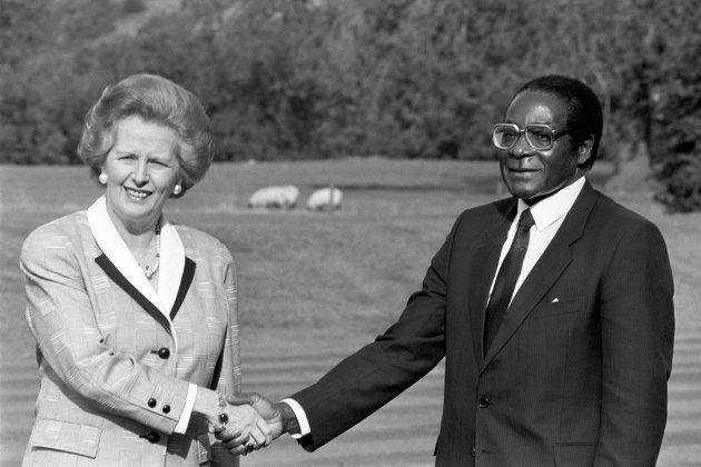 File photo dated 01/10/88 of Margaret Thatcher with Robert Mugabe, whose legacy as one of the most ruthless tyrants of modern times will remain long after his days as notorious statesman of Zimbabwe are over.