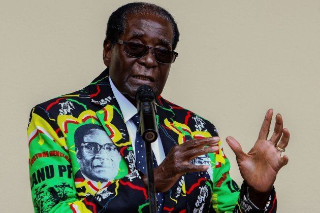 This file photo taken on December 17, 2016 shows former Zimbabwean president Robert Mugabe speaking at the party's annual conference on December in Masvingo. Mugabe was removed as the ZANU-PF party leader, according to party delegate on November 19, 2017. / AFP PHOTO / Jekesai NJIKIZANA