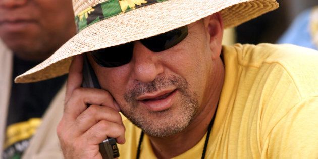 Trevor Manuel sporting a sexy ANC straw hat at the party's national conference in Stellenbosch in 2002. ANC gatherings are heaven for political shoppers, with great merchandise and wonderful bargains to be had.