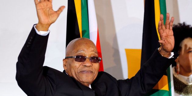 South Africa's President Jacob Zuma waves as he arrives to address the National Youth Day commemoration, under the theme