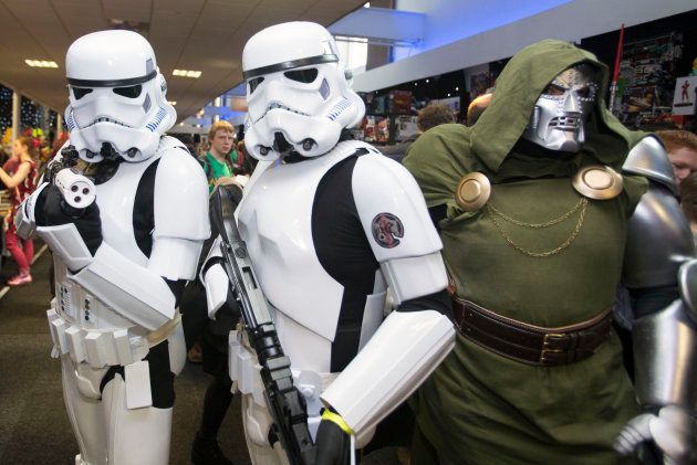 People in Stormtrooper costumes at Edinburgh's Corn Exchange on the first day of Capital Sci-Fi Con, the pop culture, comic and movie convention which raises money for Children's Hospice Association Scotland (CHAS). (Photo by David Cheskin/PA Images via Getty Images)