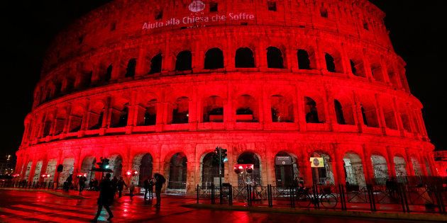 The Colosseum is lit up in red to draw attention to the persecution of Christians around the world in Rome, Italy, February 24, 2018.