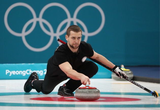 Curler Alexander Krushelnitsky, Olympic Athlete from Russia, delivers a stone in the mixed doubles curling bronze medal match with Anastasia Bryzgalova against Norway's Kristin Skaslien and Magnus Nedregotten during the 2018 Winter Olympic Games, at the Gangneung Curling Centre.