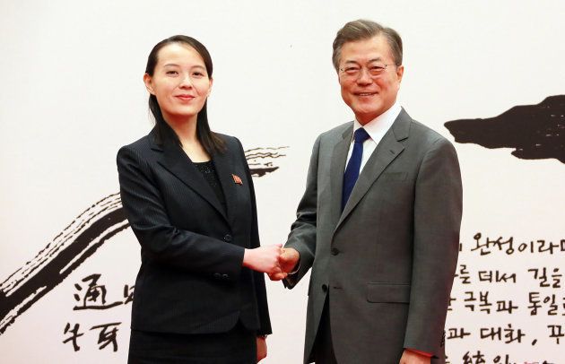 This photo taken on February 10, 2018 and released February 11 by North Korea's official Korean Central News Agency (KCNA) shows South Korea's President Moon Jae-in (R) posing with North Korean leader Kim Jong Un's sister Kim Yo Jong (L) before their meeting at the presidential Blue House in Seoul.