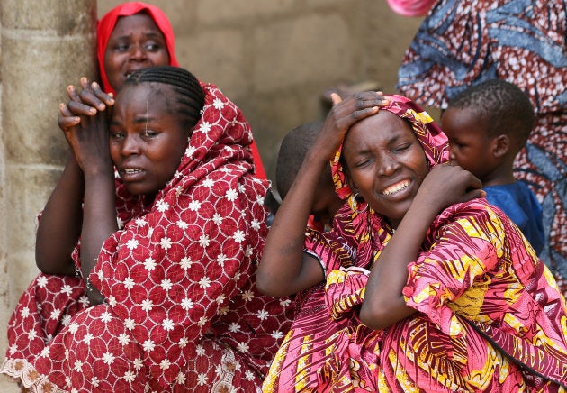 Relatives of missing school girls react in Dapchi in the northeastern state of Yobe, after an attack on the village by Boko Haram, Nigeria February 23, 2018. REUTERS/Afolabi Sotunde TPX IMAGES OF THE DAY