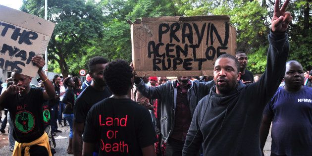 A small group of pro-Zuma members from Black First Land First (BLF) confront anti-Zuma protestors outside the Gupta's Johannesburg residence in April 2017.