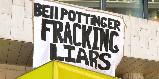 Anti-fracking demonstrators outside the office of Bell Pottinger in High Holborn in central London, UK.