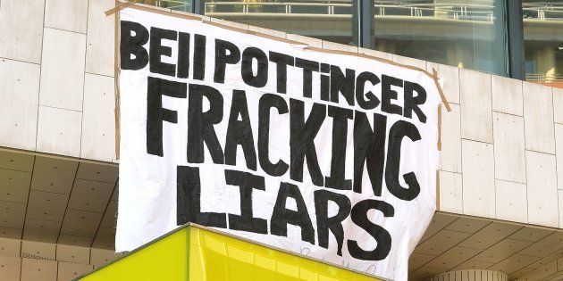Anti-fracking demonstrators outside the offices of Bell Pottinger in High Holborn in central London, UK.