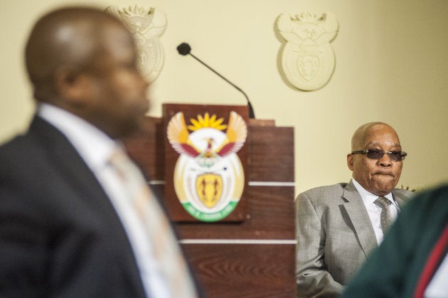 Then president Jacob Zuma looks on as David van Rooyen is sworn in as minister of finance on 10 December 2015.