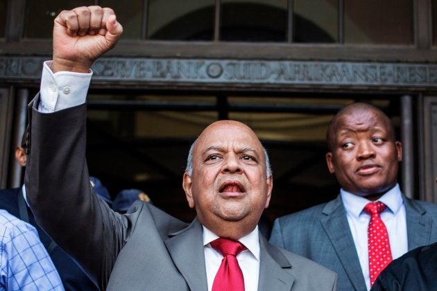 Pravin Gordhan on the day after was fired as minister of finance on 30 March 2017. Next to him is Lungisa Fuzile, who resigned as Treasury director-general shortly afterwards.