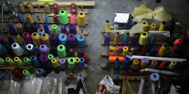Sewing threads are seen at a family-owned factory at a house in Lima, Peru, July 12, 2017.