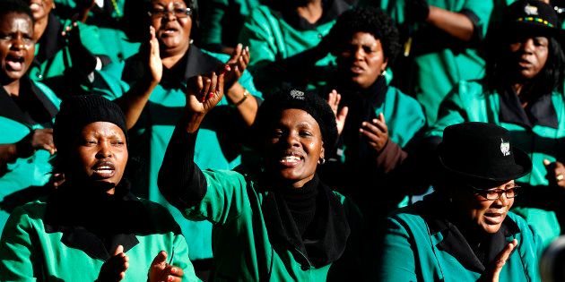 Members of the African National Congress Women's League (ANCWL) sing church songs during the funeral of the late Albertina Sisulu in Soweto, June 11, 2011.