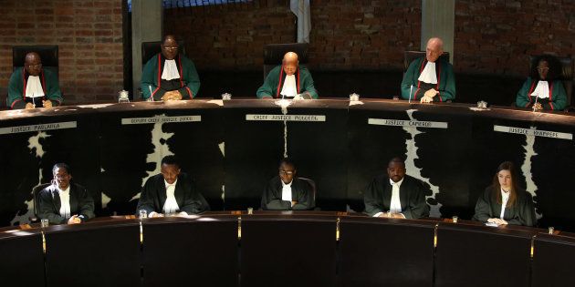South Africa's Chief Justice Mogoeng Mogoeng (Top, C) looks on with other judges before making a ruling at the Constitutional Court in Johannesburg, South Africa, June 22, 2017.
