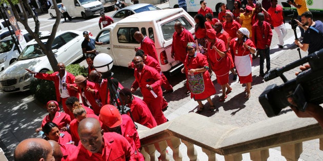 Julius Malema, leader of the minority opposition EFF party, walks out of Parliament during the election of Cyril Ramaphosa as president in Cape Town. February 15, 2018.