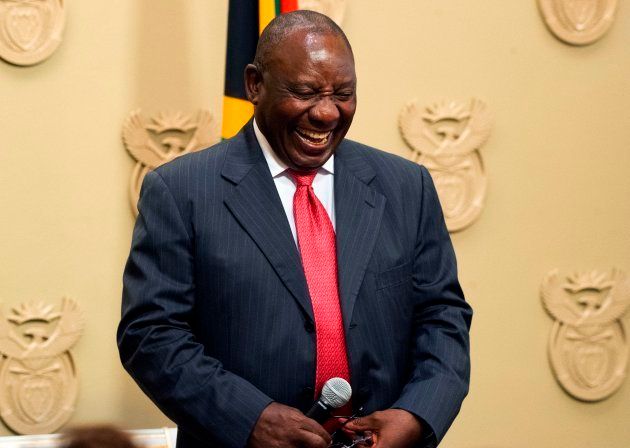 South Africa's new president Cyril Ramaphosa reacts as he is sworn into office after being elected by the members of Parliament in Cape Town, on February 15, 2018.