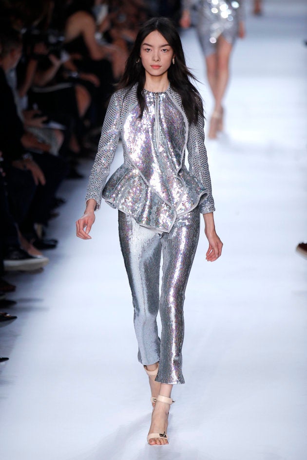 A model presents a creation by Italian designer Riccardo Tisci for French fashion house Givenchy as part of his Spring/Summer 2012 women's ready-to-wear fashion collection in Paris October 2, 2011. REUTERS/Benoit Tessier (FRANCE - Tags: FASHION)