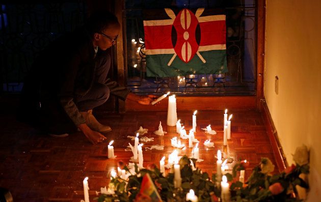 Muthoni Ngige, a member the Kenyan LGBTQ community pays tribute to the victims of the mass shooting at the Pulse gay nightclub in Orlando, U.S., in Kenya's capital Nairobi June 14, 2016.