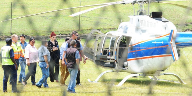 Ajay Gupta (in the red shirt and sunglasses) and Ronica Ragavan (in the pink shirt) at Optimum coal mine on February 07, 2018 in Middelburg.