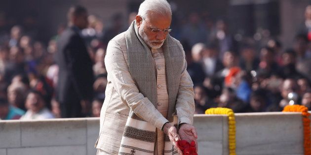 India's Prime Minister Narendra Modi pays his respects at the Mahatma Gandhi memorial on Gandhi?s death anniversary at Rajghat in New Delhi, India January 30, 2018.