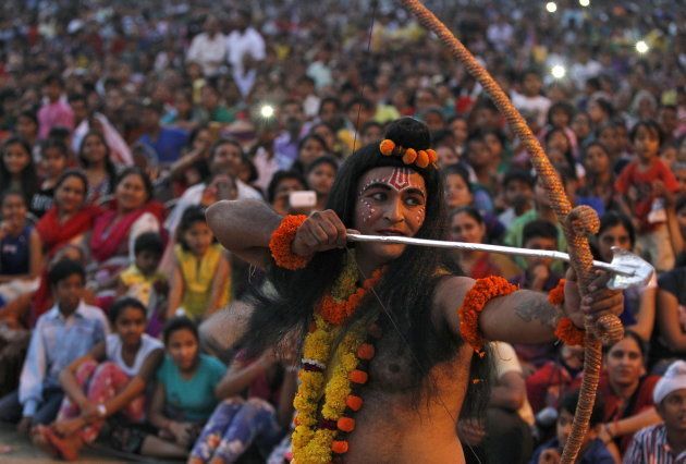 An artist dressed as Hindu God Rama acts in a religious play during Dussehra festival celebrations in Chandigarh, India, October 22, 2015. Effigies of the 10-headed Demon King "Ravana" are burnt on Dussehra, the Hindu festival that commemorates the triumph of Hindu god Rama over the Ravana, marking the victory of good over evil.