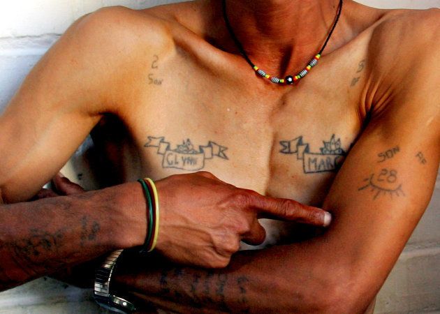 A former Pollsmoor inmate shows off his prison gang tattoos.