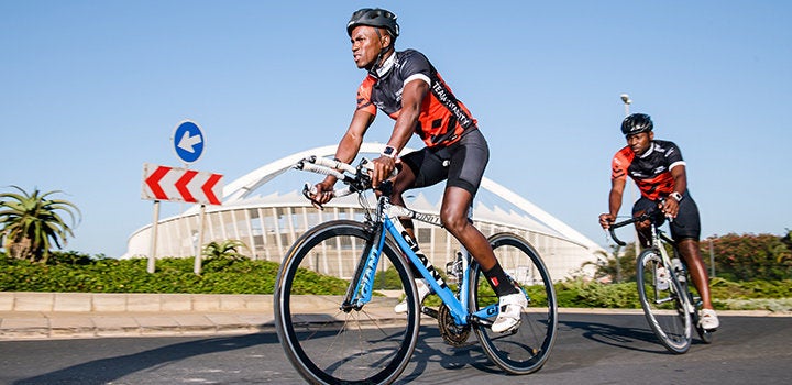 Durban triathlete Mhlengi Gwala (L).