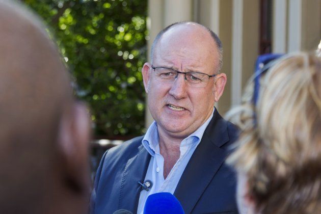 DA mayor for Nelson Mandela Bay municipality, Athol Trollip, addresses supporters and journalists during a rally outside the mayor's office on April 14, 2016 in Port Elizabeth.