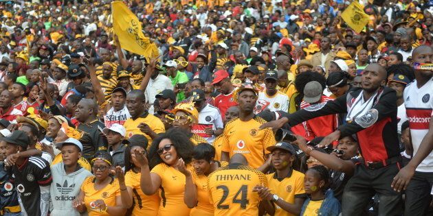 Fans during the Carling Black Label Champion Cup match between Orlando Pirates and Kaizer Chiefs at FNB Stadium, where a stampede left two supporters dead.