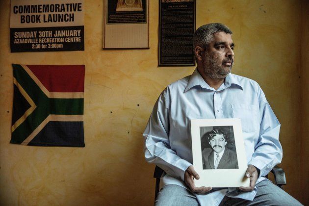 Imtiaz Cajee, the nephew of Ahmed Timol, who died in police custody in October 1971, holds a portrait of his uncle at his house on May 25, 2017 in Pretoria.