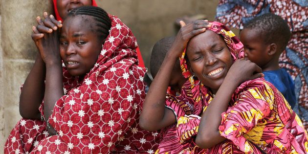 Relatives of missing school girls react in Dapchi in the northeastern state of Yobe, after an attack on the village by Boko Haram, Nigeria February 23, 2018.