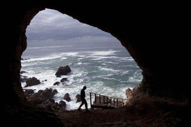 A view of the sea and rocks from inside a cave called PP13B on May 26, 2010, at Pinnacle Point near Mossel Bay South Africa.