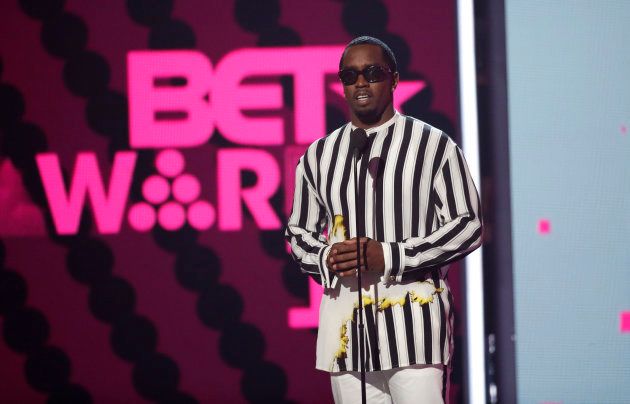 Sean "Diddy" Combs presents an award. REUTERS/Mario Anzuoni