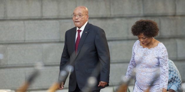 South Africa's President Jacob Zuma arrives with Speaker of Parliament Baleka Mbete to give his State of the Nation address at the opening session of Parliament in Cape Town, February 11, 2016. REUTERS/Rodger Bosch/Pool