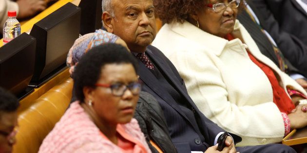 Former Finance Minister Pravin Gordhan listens during the motion of no confidence against South African president Jacob Zuma in parliament in Cape Town, South Africa, August 8, 2017. REUTERS/Mark Wessels/Pool