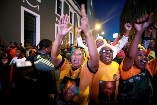 Pro-Zuma supporters celebrate after the vote of no confidence against President Jacob Zuma failed in Cape Town, South Africa, August 8, 2017. REUTERS/Mike Hutchings