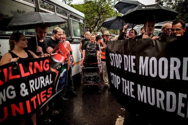 Members of South African minority-rights organisation AfriForum and other civil society organisations prepare to march to the Union Buildings to raise awareness on farm attacks on November 25, 2017 in Pretoria, South Africa.
