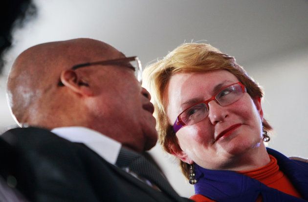 Then-president Jacob Zuma speaks to Helen Zille. who was DA leader at the time, at the start of the national social cohesion summit on July 4, 2012 in Soweto.