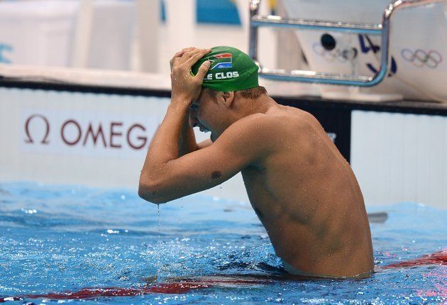 South Africa's Chad le Clos celebrates after winning the Men's 200m Butterfly Final at the Aquatics Centre, London during day four of the London 2012 Olympics.