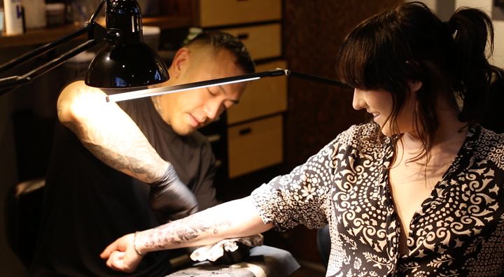 Frances gets a tattoo to cover her old scars at Black Widow Tattoo in Toronto.