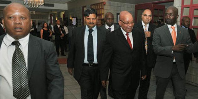 President Zuma accompanied by Atul Gupta, Minister of Public Enterprise Malusi Gigaba and CEO of The New Age Nazeem Howa.