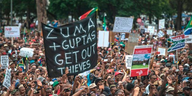 Tens of thousands of South Africans from various political and civil society groups march to the Union Buildings to protest against South African president and demand his resignation on April 7, 2017 in Pretoria.