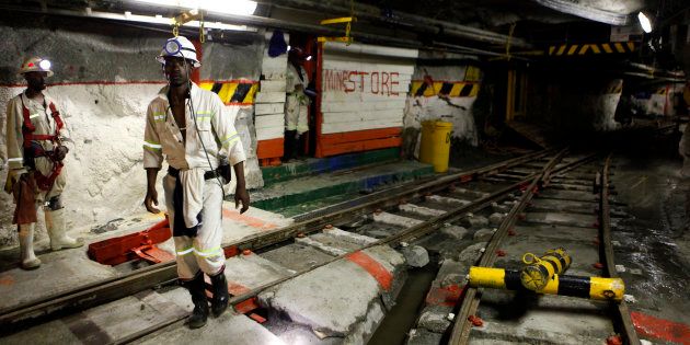 Miners are seen underground at Lonmin Plc's Karee mine in Marikana, Rustenburg 100 km (62 miles) northwest of Johannesburg, March 5, 2013.