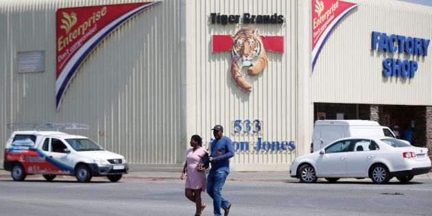 A couple leaves Tiger Brands factory shop in Germiston, Johannesburg, South Africa, March 5, 2018.