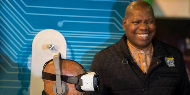 President Jacob Zuma wears a virtual reality device, while Zweli Mkhize stands next to him during a visit to the Multichoice Photo: Gallo Images / Beeld / Deaan Vivier